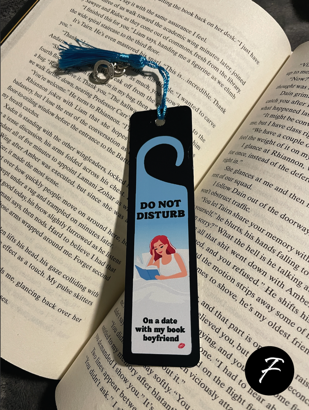 Smut Bookmark with 'Do Not Disturb' design on an open book