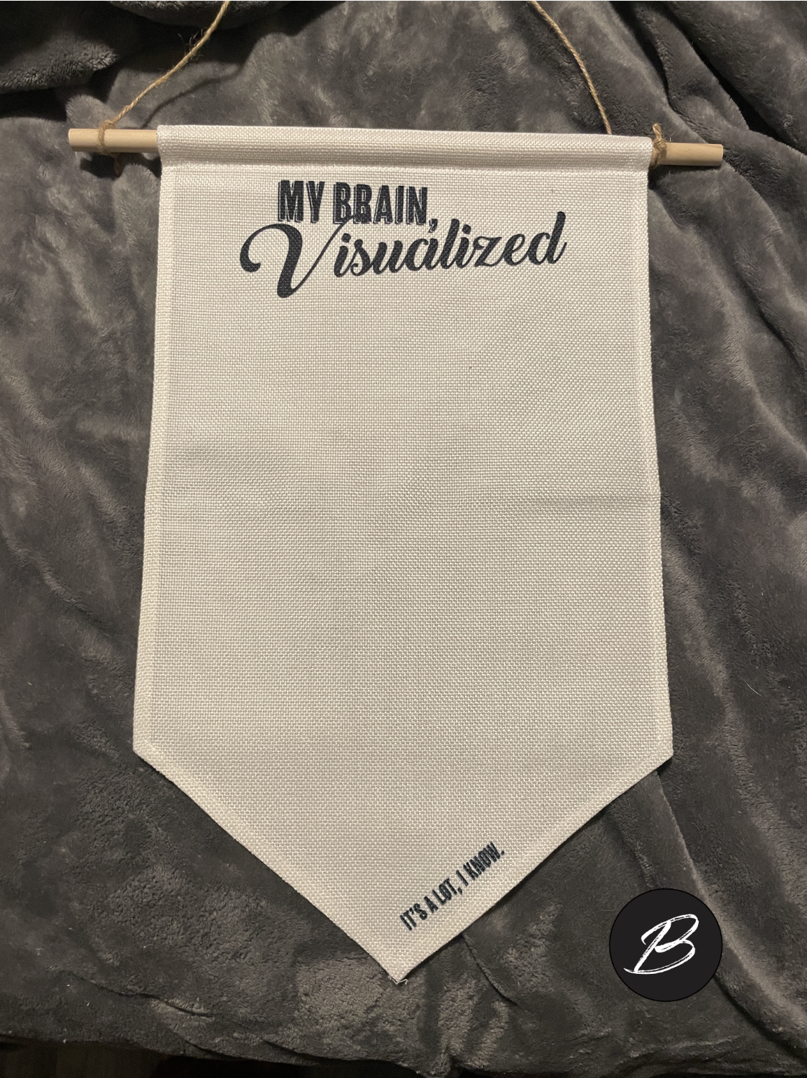 Blank canvas wall banner for displaying enamel pin collections. Text at the top reads "My Brain, Visualized" in a mix of bold and script fonts. Bottom text reads "It's A Lot, I Know."